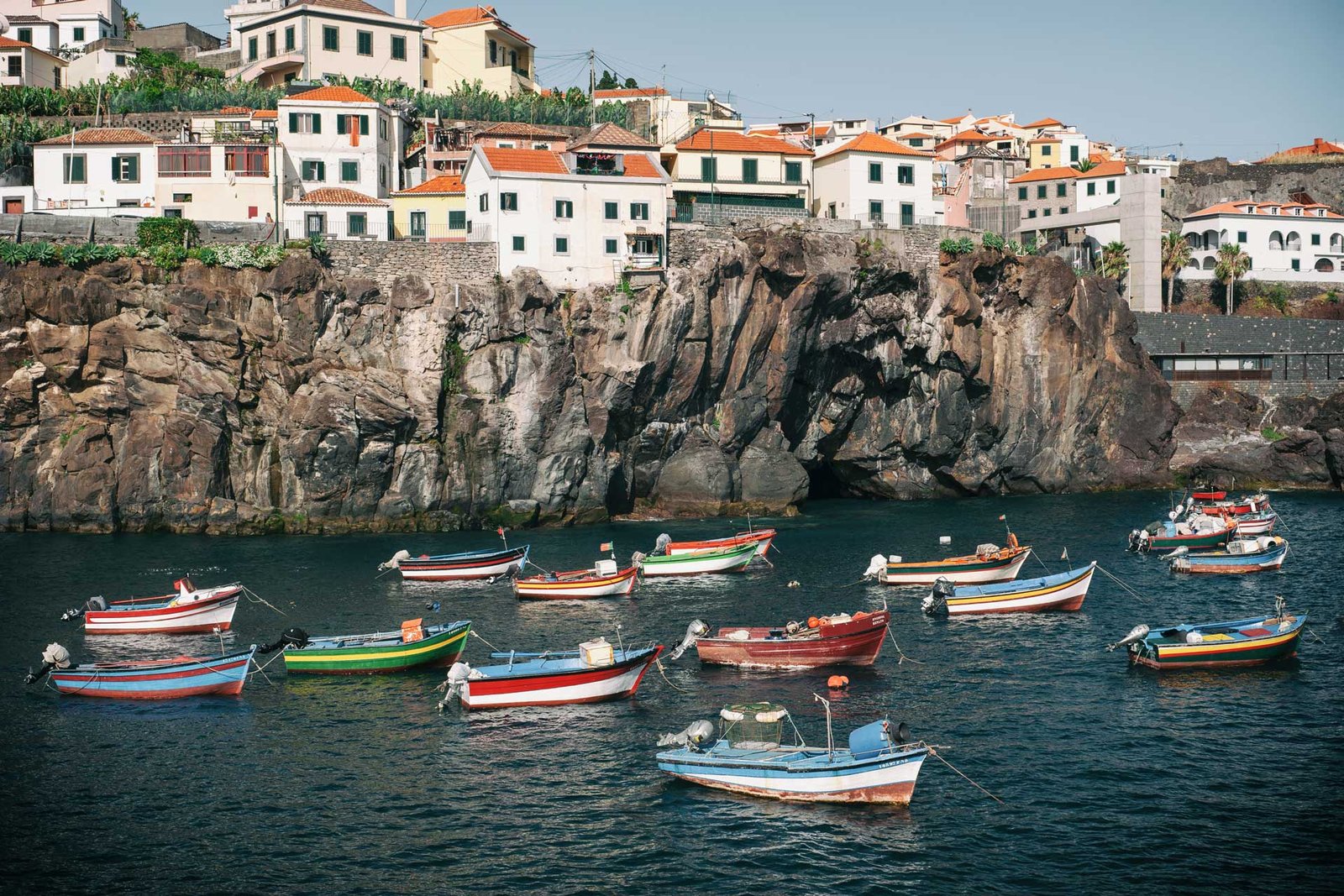 Camara de Lobos Bay full of colourful fishermen boats