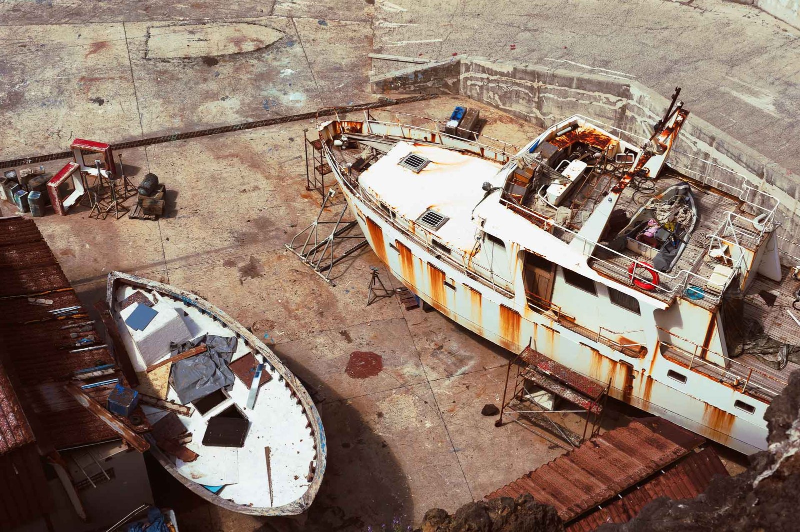 Wooden and metal anglers boats in dry dock