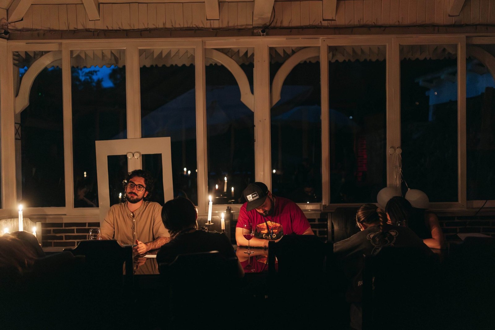 people in dark room