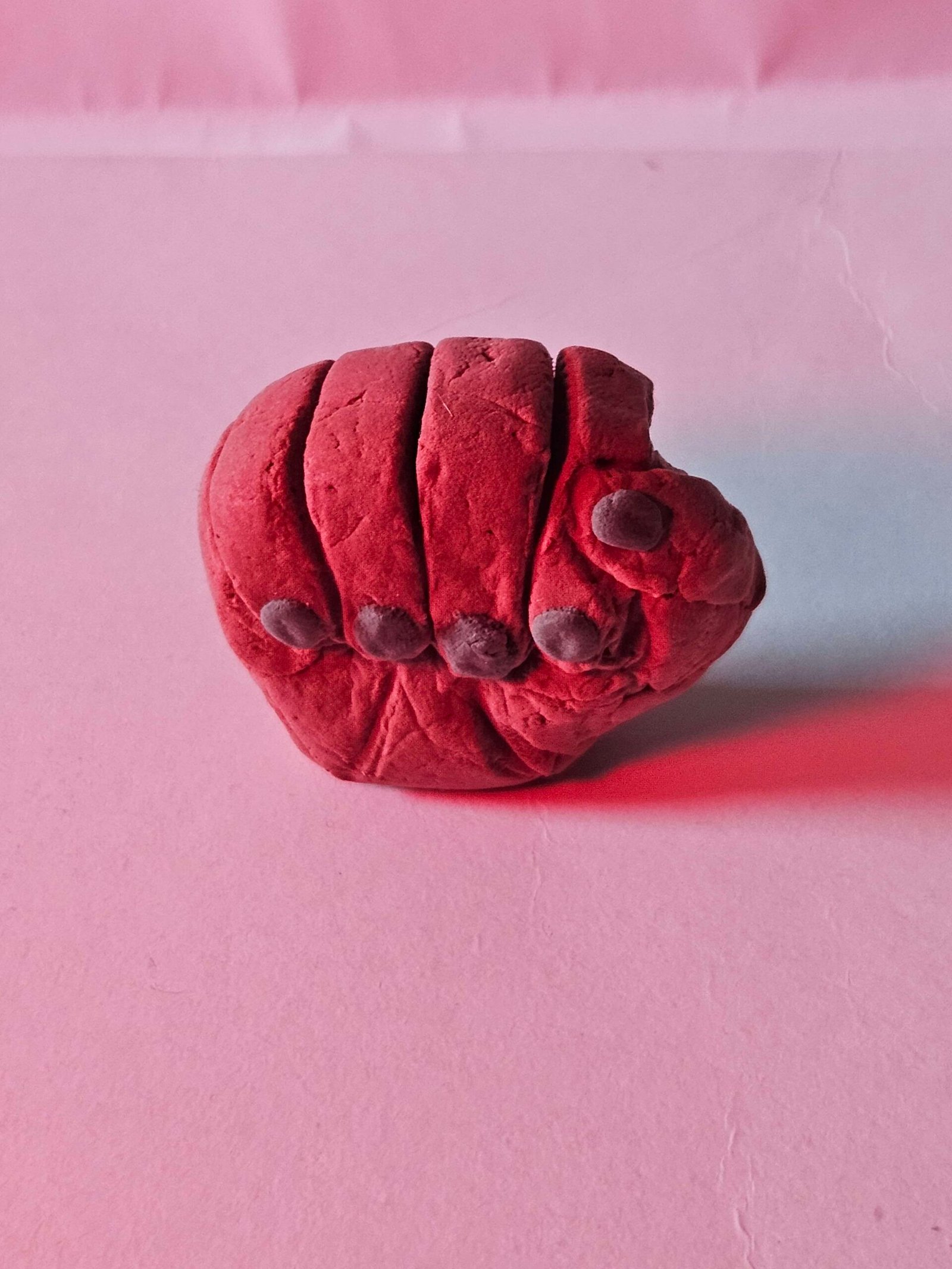 red fist from clay